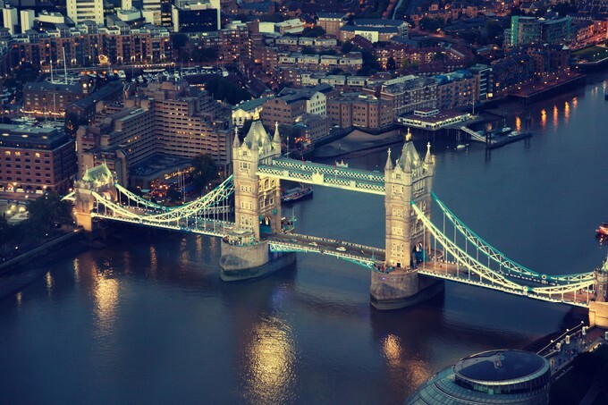 London at night with urban architectures and Tower Bridge